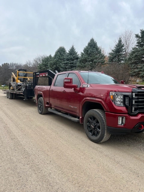 Mulcher on Trailer with Truck